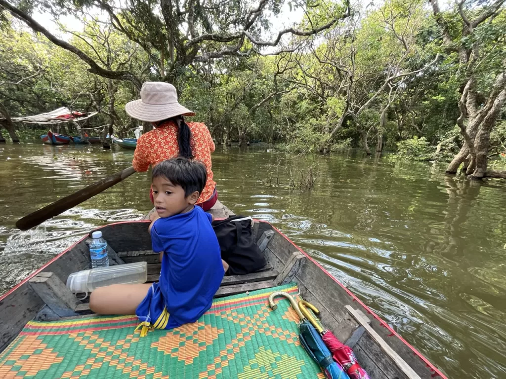 A canoe boat tour of the flooded forests of Krong Siem Reap, one of the best activities in Siem Reap Cambodia