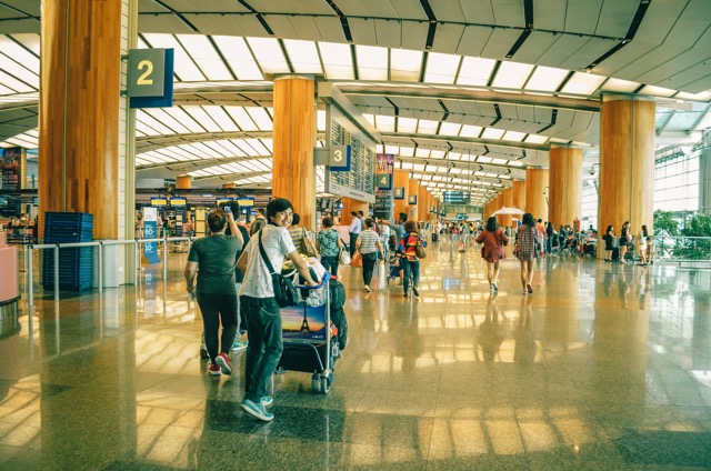 People queing in an airport, Cambodia Evisa on arrival