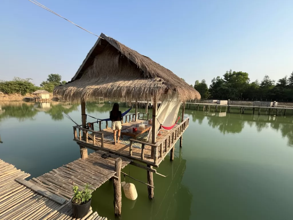 Bamboo Bridge Krong Siem Reap Cambodia bamboo huts over the fishing lake