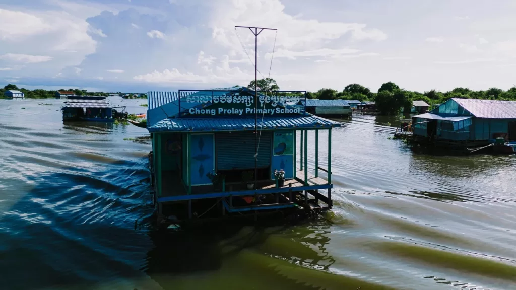 Chong Prolay Primary School as seen from the Siem Reap Battambang boat ferry service Siem Reap Cambodia