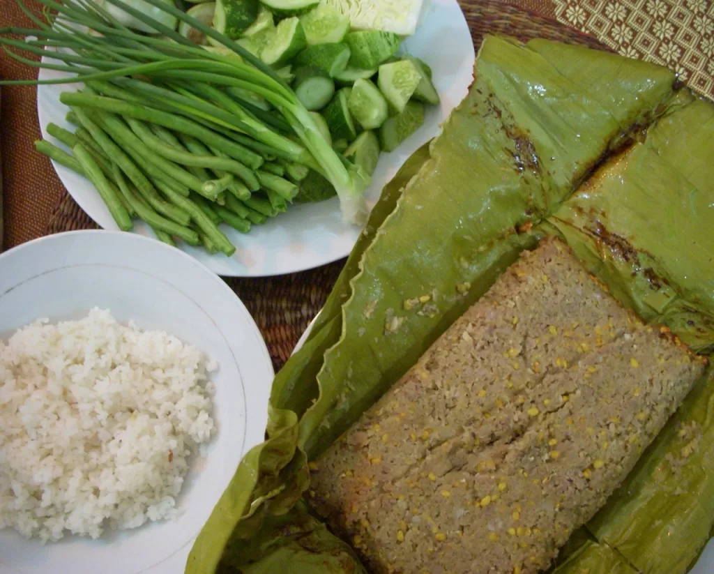 Prahok Ang - Prohok paste in banana leaf with vegetables and steamed rice