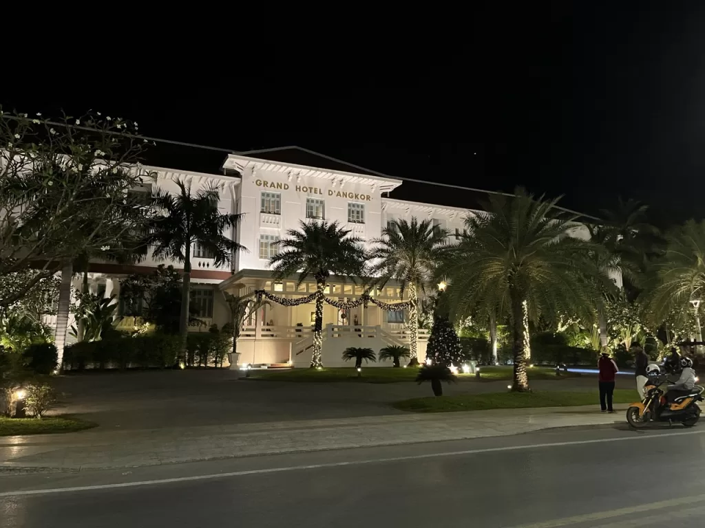 The Raffles Grand Hotel D'Angkor at night in Siem Reap Cambodia