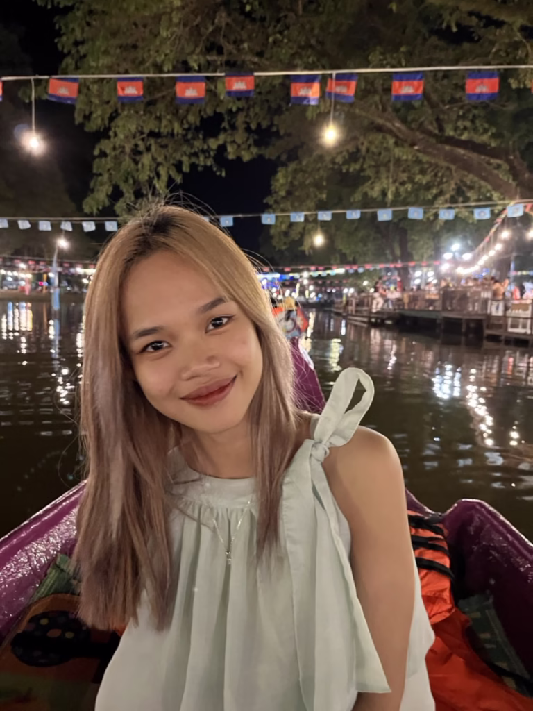 Khmer woman on boat ride during Bon Om Touk Water Festival Siem Reap Cambodia