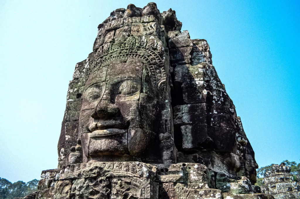 Stone head at Bayon Temple in the Angkor Archaeological Park Siem Reap
