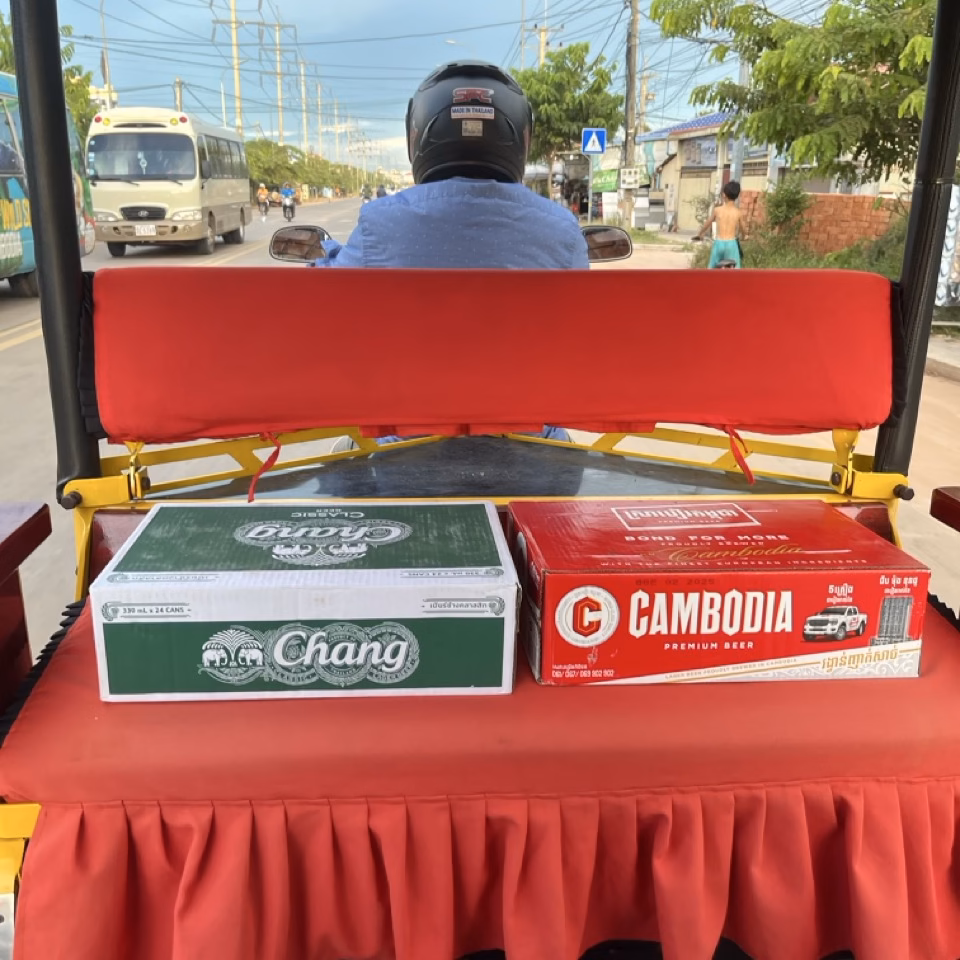 Cambodia Beer and Chang Beer in the back of a remork tuktuk in Siem Reap Cambodia